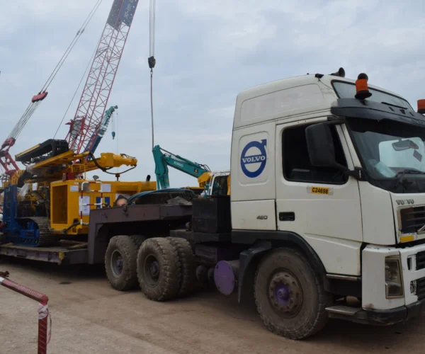 proses pengiriman alat berat