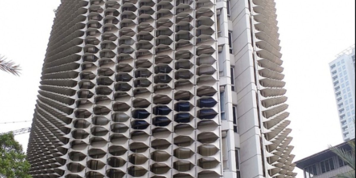 Konsep Green Building: Fasad, Vertical Garden, dan Efisiensi